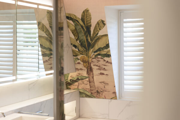 A wallpaper upclose and a mirror cabinet, as part of a steam room renovation in Edinburgh
