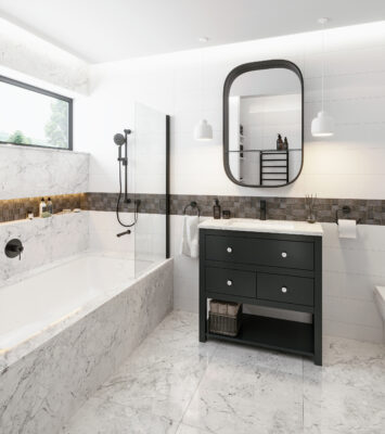A floor-mounted vanity with ample storage options and a large mirror above it. Beside the vanity is a built-in bath with a shower panel.