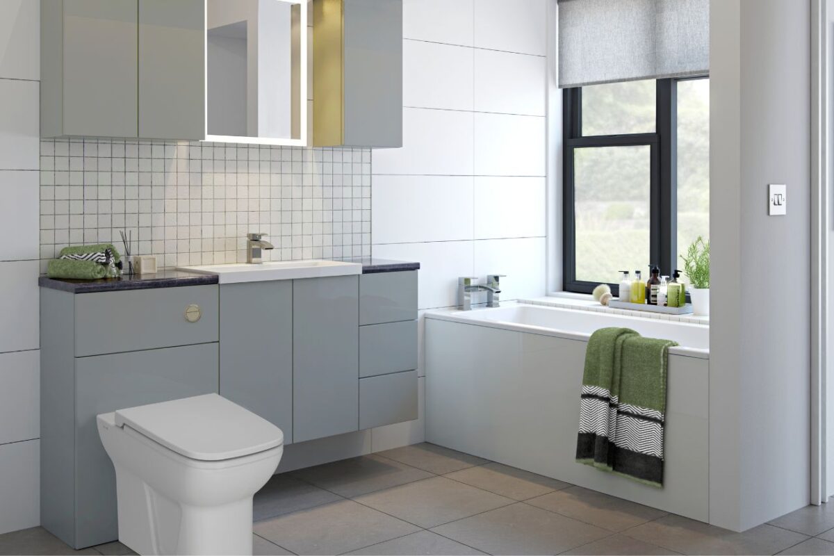 Modern bathroom with fitted cabinets and furniture for smart bathroom storage. A built-in bath and a tile backsplash beneath a wall-mounted mirror.